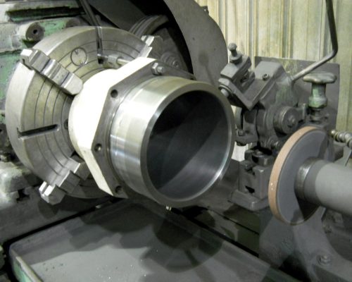 Bruderer press cylinder in grinder - ceramic coated and diamond ground